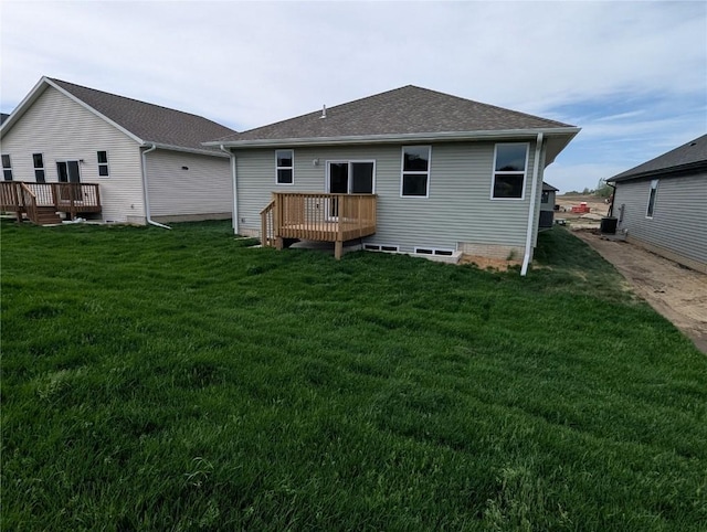 4209 Justified Dr, Marion, IA 52302 - rear view of property featuring a wooden deck, a yard, and roof with shingles