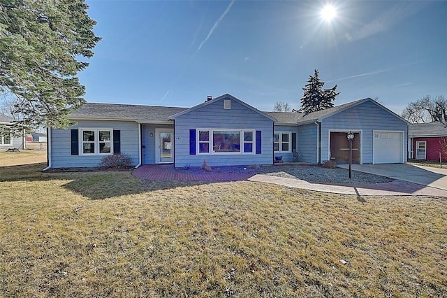 ranch-style home featuring driveway, a front lawn, and an attached garage