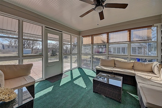 sunroom / solarium with ceiling fan