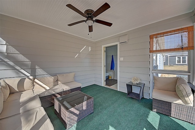 exterior space featuring dark carpet and a ceiling fan