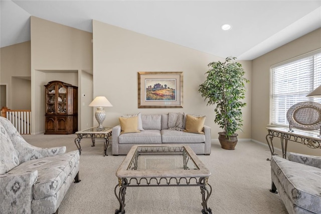 living area with lofted ceiling, recessed lighting, carpet, and baseboards