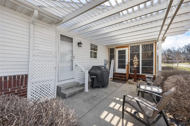 view of patio with a grill, a pergola, and entry steps