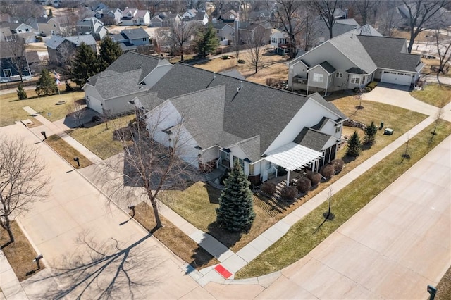 birds eye view of property with a residential view