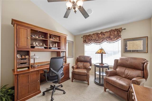 home office with lofted ceiling, light carpet, and ceiling fan