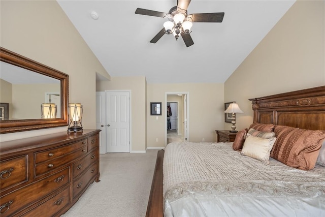 bedroom with baseboards, light colored carpet, a ceiling fan, and vaulted ceiling