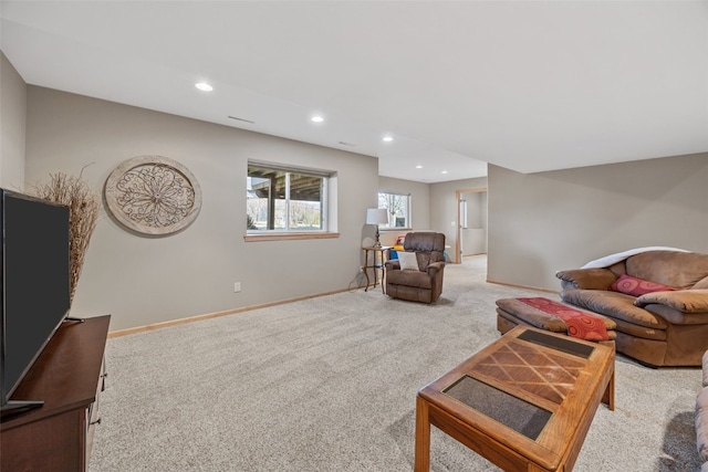 living area with carpet flooring, recessed lighting, and baseboards