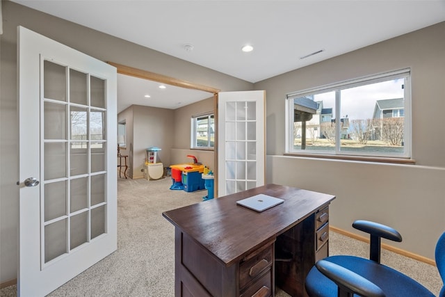 carpeted home office featuring recessed lighting, french doors, visible vents, and baseboards