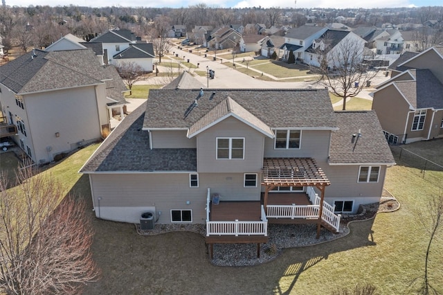 birds eye view of property with a residential view