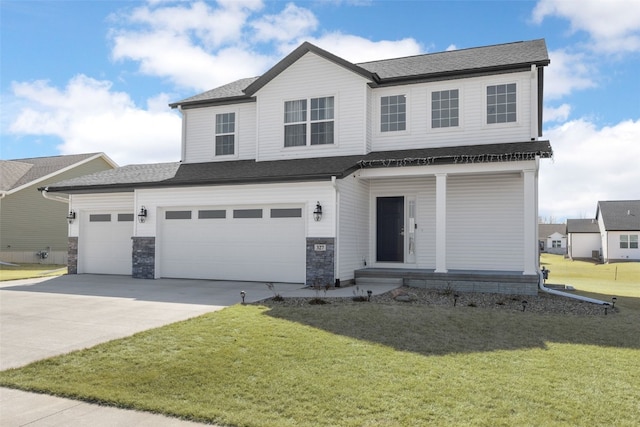 view of front of property featuring a garage, driveway, a shingled roof, and a front yard