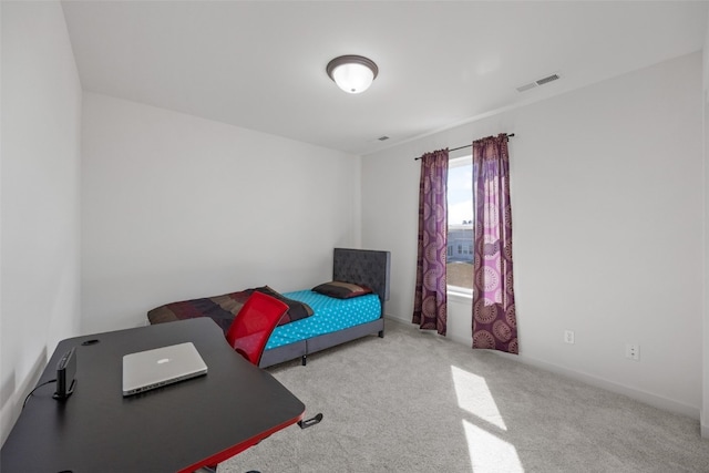 bedroom featuring carpet and visible vents