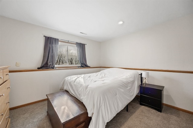 carpeted bedroom with recessed lighting, visible vents, and baseboards