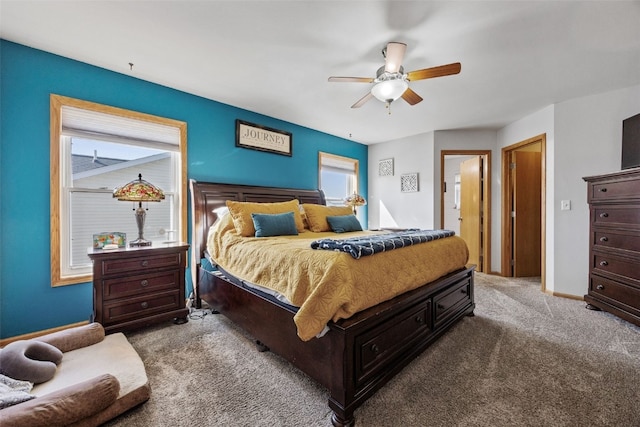 bedroom featuring baseboards, ceiling fan, and carpet floors