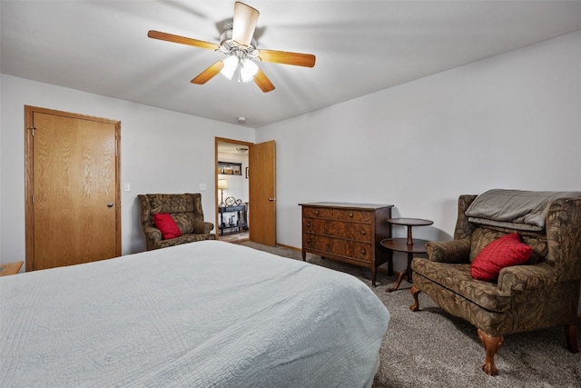 bedroom with ceiling fan and carpet floors