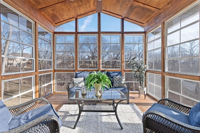 sunroom / solarium with plenty of natural light, wood ceiling, and lofted ceiling