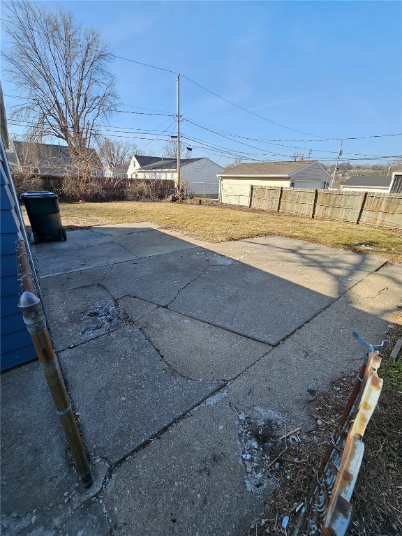 view of yard featuring a patio and fence