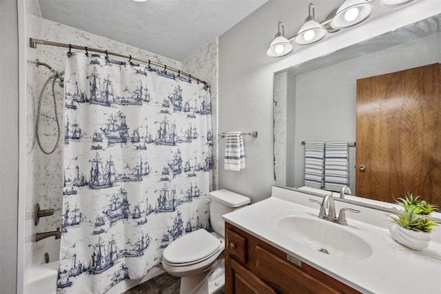 bathroom featuring a textured ceiling, toilet, vanity, and shower / tub combo