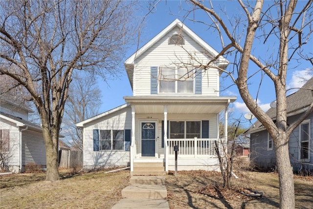 traditional-style home featuring a porch