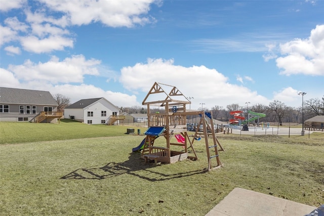 view of playground featuring a yard