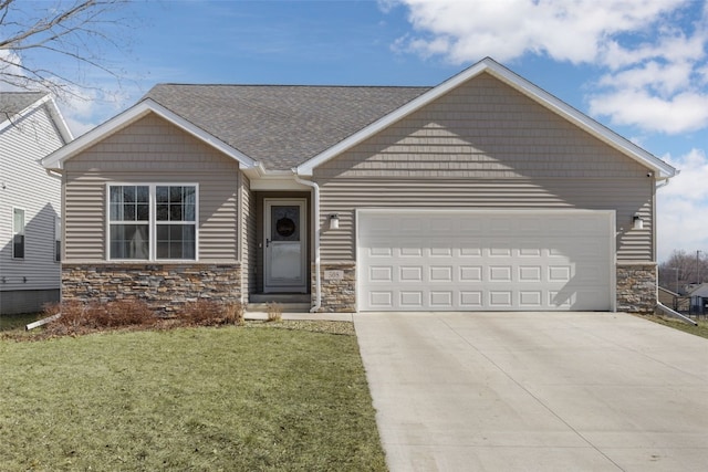 view of front facade featuring a garage, stone siding, and driveway