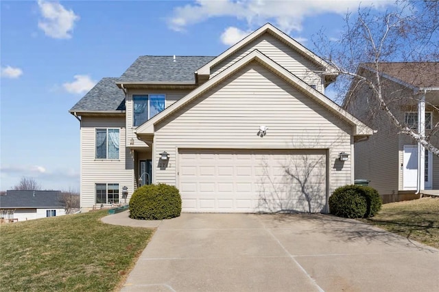 view of front of property with a front lawn, a garage, driveway, and a shingled roof