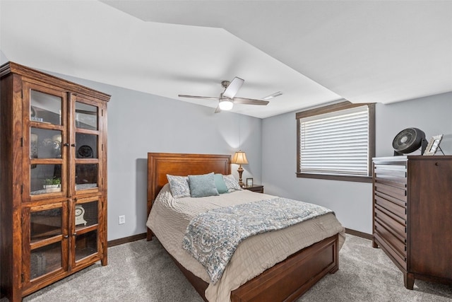 bedroom featuring ceiling fan, baseboards, and light carpet