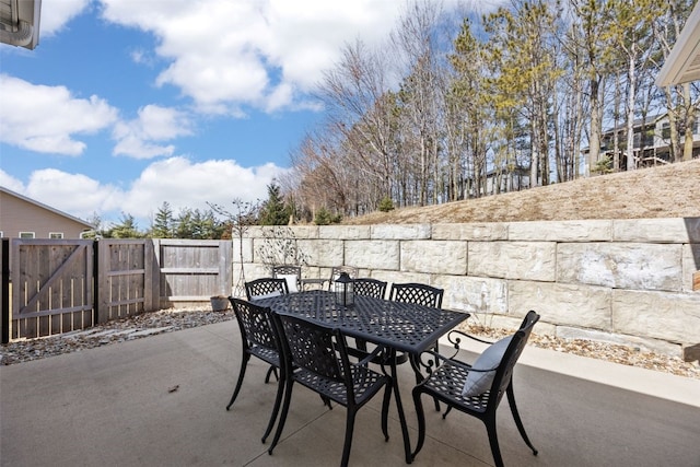 view of patio / terrace with a fenced backyard and outdoor dining space