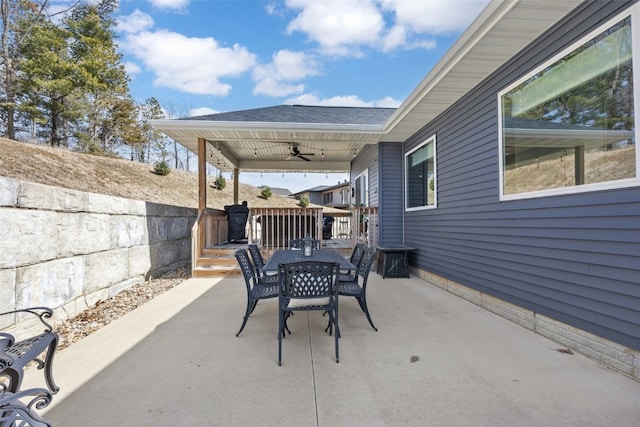 view of patio / terrace featuring outdoor dining space and a ceiling fan