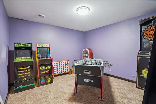 game room with carpet and baseboards