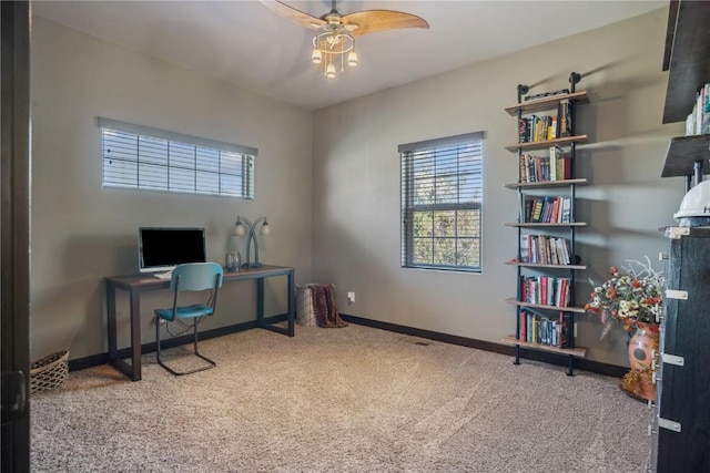 office with baseboards, carpet, and ceiling fan