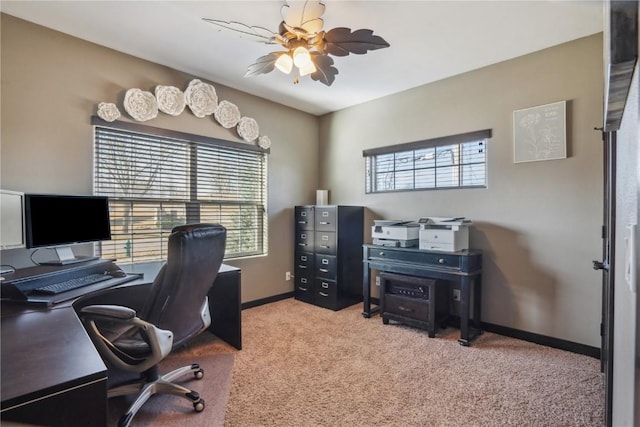 home office with carpet flooring, a healthy amount of sunlight, baseboards, and ceiling fan