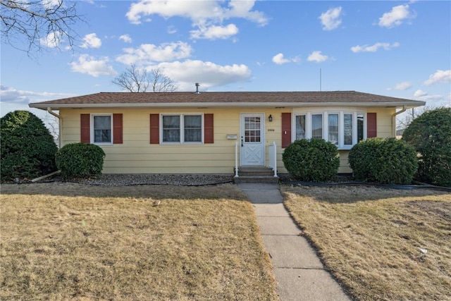 single story home with a front yard