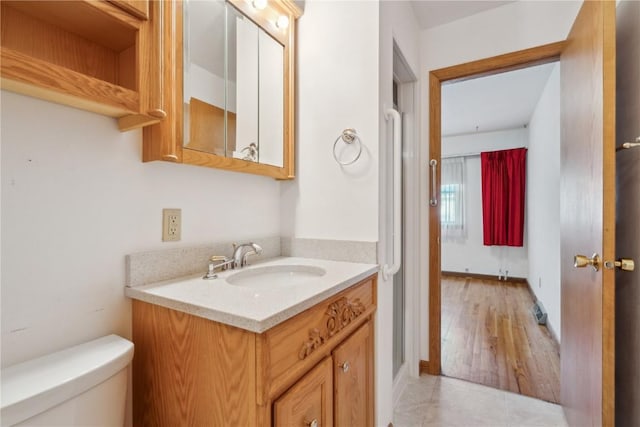 bathroom with vanity and toilet