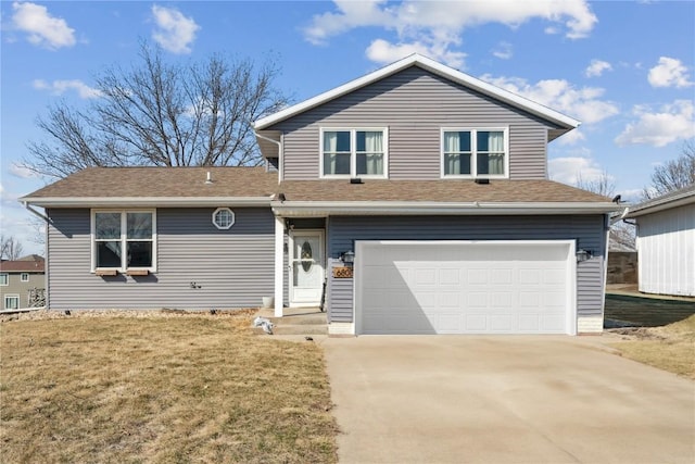 traditional-style house with a front lawn, an attached garage, driveway, and roof with shingles