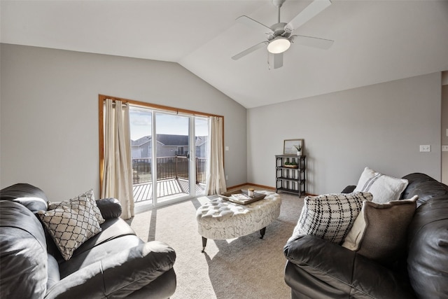 living area featuring ceiling fan, baseboards, lofted ceiling, and carpet floors