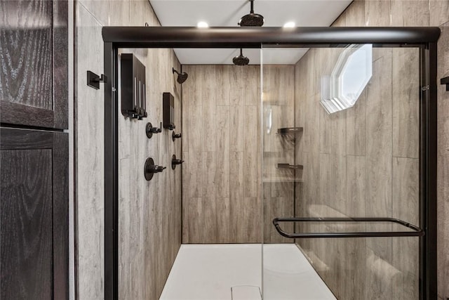 bathroom featuring a shower stall