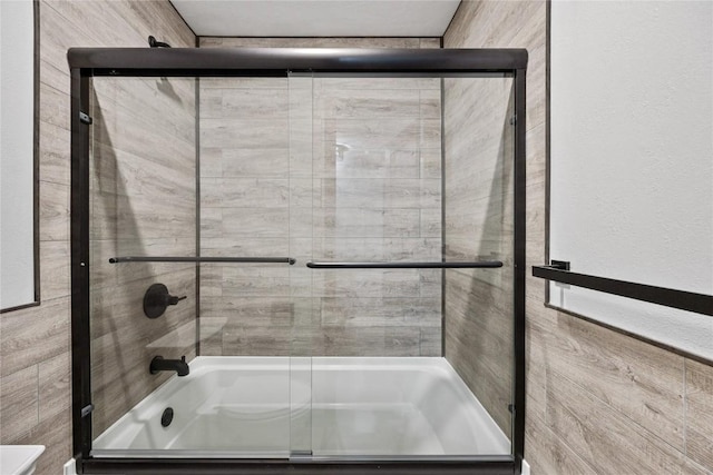 full bath with enclosed tub / shower combo