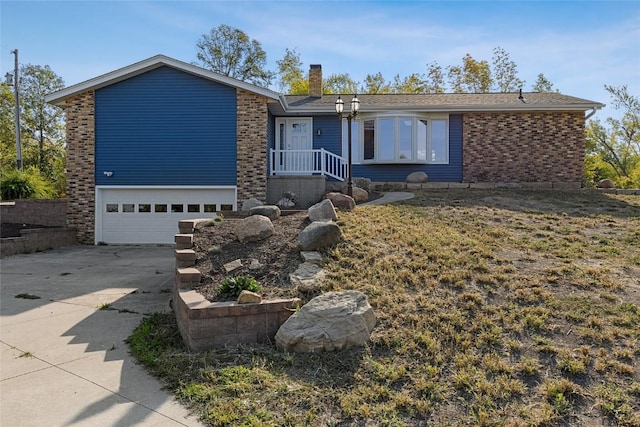 ranch-style house with concrete driveway, an attached garage, a chimney, and brick siding