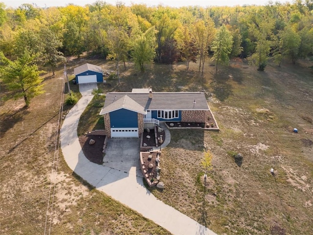 aerial view with a wooded view