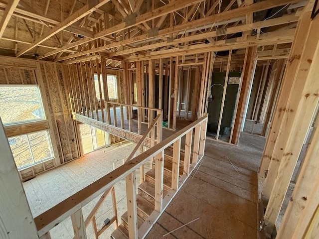 miscellaneous room featuring an upstairs landing