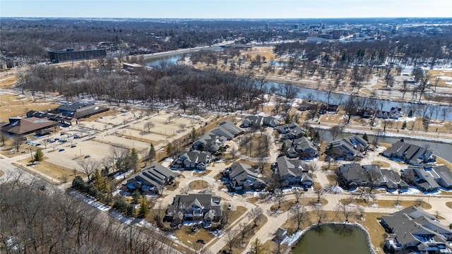 bird's eye view with a residential view and a water view