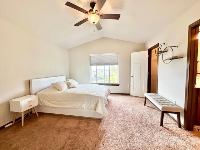 bedroom featuring baseboards, light carpet, ceiling fan, and vaulted ceiling