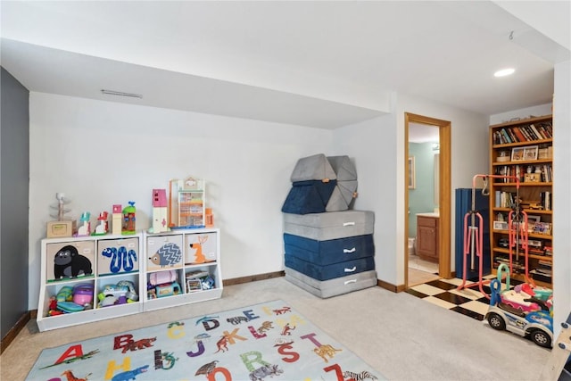 recreation room featuring baseboards