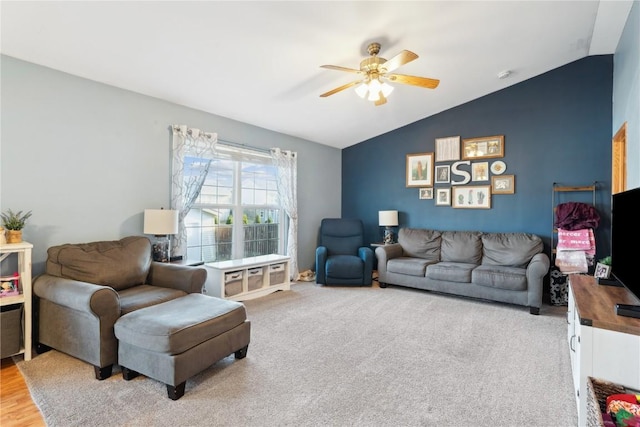 living room with lofted ceiling and a ceiling fan