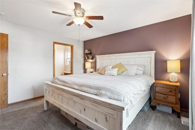 carpeted bedroom featuring baseboards and ceiling fan