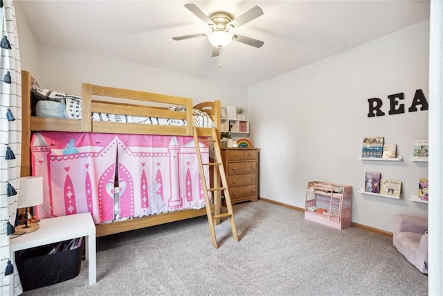 bedroom with baseboards, carpet floors, and a ceiling fan