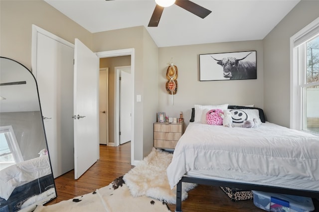 bedroom featuring ceiling fan and wood finished floors