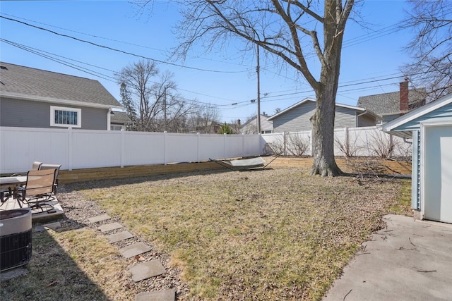 view of yard featuring a patio and a fenced backyard