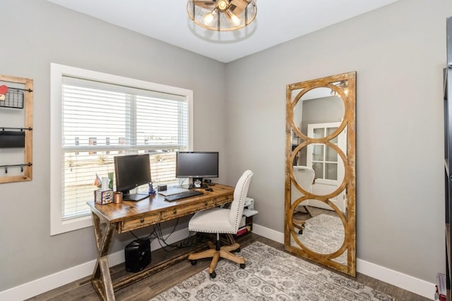 office with baseboards and wood finished floors