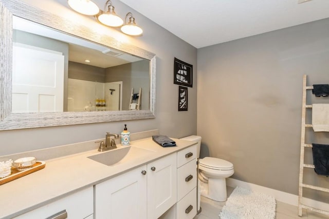 full bathroom with walk in shower, toilet, vanity, and baseboards