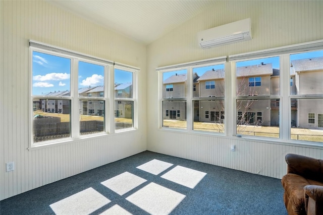 sunroom featuring a wall mounted air conditioner, a residential view, and lofted ceiling